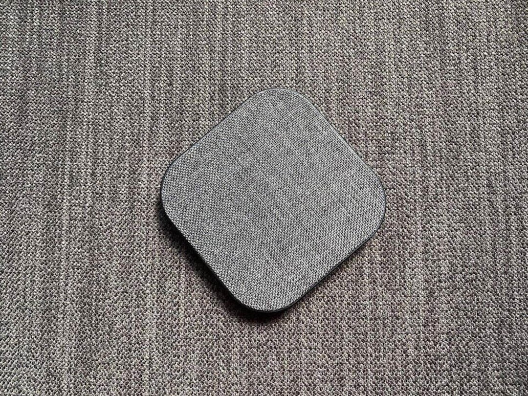 wireless charging pad on table